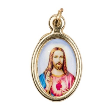 Médaille métal couleur dorée ovale H. 2,5 cm avec résine, plusieurs saints.