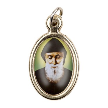 Médaille métal couleur dorée ovale H. 2,5 cm avec résine, plusieurs saints.