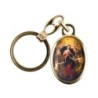 Porte-cles en metal couleur doree H. 3,8 cm avec resine couleur des saints.