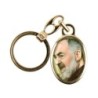 Porte-cles en metal couleur doree H. 3,8 cm avec resine couleur des saints.