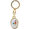 Porte-cles en metal couleur doree H. 3,8 cm avec resine couleur des saints.
