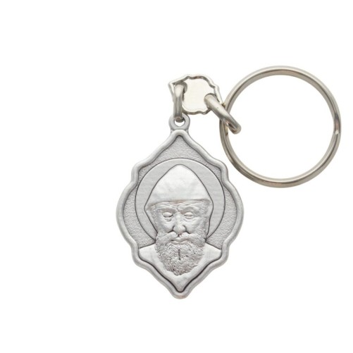 Porte-clés octogonal en métal argenté, H. 4 cm.