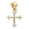Croix de cou dorée supérieur avec pierres OZ aux extrémités et au centre. H. 1.1 cm.