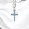 Collier avec chaîne et croix avec des zircons bleu 1.6 cm en acier inoxydable de couleur argentée, L 45 cm ajustable.
