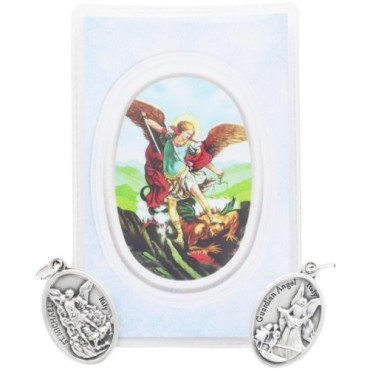 Medaille metal couleur argentee forme ovale H. 2,2 cm dans pochette avec image. Plusieurs saints