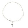 Bracelet dizainier en argent 925 °/°° ajustable sur chaîne serpent, grains Ø 3 mm (2,60 g), avec croix. Livré en boîte.