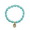 Bracelet sur elastique couleur doree grains imitation nacre Ø 7 mm, medaille Vierge Miraculeuse.