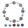 Bracelet sur elastique avec medaille de Saint Benoit en metal et grains en verre. VENDU PAR LOT DE 5 ASSORTIS.