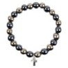 Bracelet sur elastique en hematite et pierre naturelle ou synthetique Ø 7 mm avec croix..