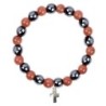 Bracelet sur elastique en hematite et pierre naturelle ou synthetique Ø 7 mm avec croix..