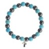 Bracelet sur elastique en hematite et pierre naturelle ou synthetique Ø 7 mm avec croix..
