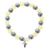 Bracelet sur elastique en hematite et pierre naturelle ou synthetique Ø 7 mm avec croix..