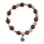 Bracelet dizainier sur élastique grains bois et médailles de saint Benoit Ø 1 cm..