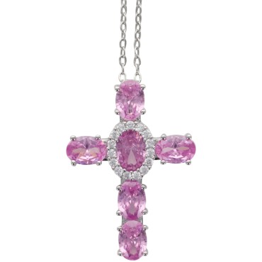 Collier avec chaine et croix H. 3 cm en laiton de couleur argentée. L 40 cm. Existe de différentes couleurs.