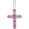 Collier avec chaine et croix H. 3 cm en laiton de couleur argentée. L 40 cm. Existe de différentes couleurs.