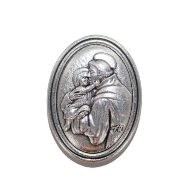 Plaque auto ovale H. 3.8 cm en metal couleur argentee. Plusieurs saints.