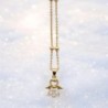 Collier avec chaîne et pendentif ange avec zircon, H. 1.4 cm. Laiton dorée supérieur, L. 44 cm ajustable.