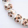 Bracelet sur élastique grains porcelaine Ø 1 cm. Fleur Orange