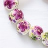 Bracelet sur élastique grains porcelaine Ø 1 cm. Fleur Orange