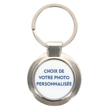 Porte-clés en métal couleur argenté de forme ronde Ø 3.8 cm. Livré en boite cadeaux. Existe avec différents Saints