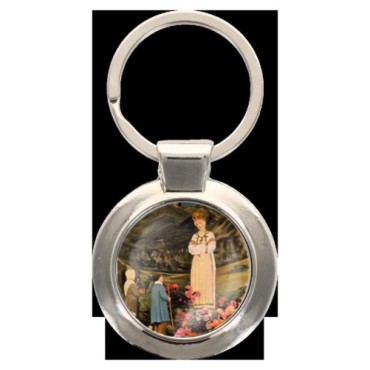 Porte-clés en métal couleur argenté de forme ronde Ø 3.8 cm. Livré en boite cadeaux. Existe avec différents Saints
