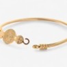 Bracelet rigide en acier inoxydable doré avec médaille de St Benoit