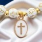 Bracelet sur élastique avec croix sur chaque grains Ø 7 mm