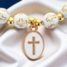 Bracelet sur élastique avec croix sur chaque grains Ø 7 mm