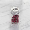 Chapelet avec grains en bois de rose Ø 4 mm sur Chaine. Livre dans une boite en forme de flacon..