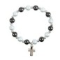 Bracelet sur elastique en hematite avec grains nacres Ø 8 mm, avec croix.
