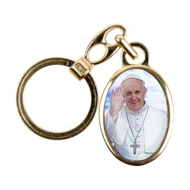 Porte-cles en metal couleur doree H. 3,8 cm avec resine couleur des saints.