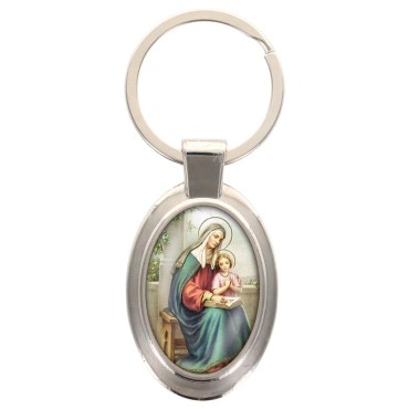 Porte-clés en métal de couleur argenté de forme ovale H. 4.3 cm. Livré en boite cadeaux. Existe avec différents Saints.