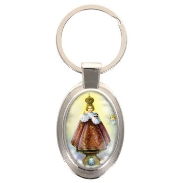 Porte-clés en métal de couleur argenté de forme ovale H. 4.3 cm. Livré en boite cadeaux. Existe avec différents Saints.