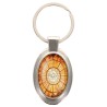Porte-clés en métal de couleur argenté de forme ovale H. 4.3 cm. Livré en boite cadeaux. Existe avec différents Saints.