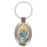 Porte-clés en métal de couleur argenté de forme ovale H. 4.3 cm. Livré en boite cadeaux. Existe avec différents Saints.