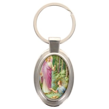 Porte-clés en métal de couleur argenté de forme ovale H. 4.3 cm. Livré en boite cadeaux. Existe avec différents Saints.