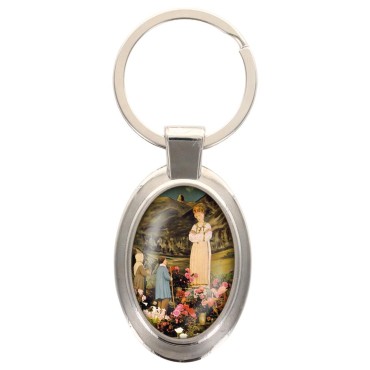 Porte-clés en métal de couleur argenté de forme ovale H. 4.3 cm. Livré en boite cadeaux. Existe avec différents Saints.