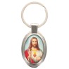 Porte-clés en métal de couleur argenté de forme ovale H. 4.3 cm. Livré en boite cadeaux. Existe avec différents Saints.