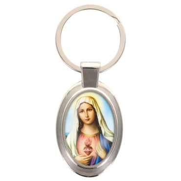Porte-clés en métal de couleur argenté de forme ovale H. 4.3 cm. Livré en boite cadeaux. Existe avec différents Saints.