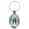 Porte-clés en métal de couleur argenté de forme ovale H. 4.3 cm. Livré en boite cadeaux. Existe avec différents Saints.