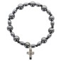 Bracelet dizainier sur élastique grains en hématite ronds et ovales avec croix en métal..