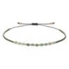 Bracelet dizainier sur corde réglable. Existe avec différentes pierres, Ø 3 mm.