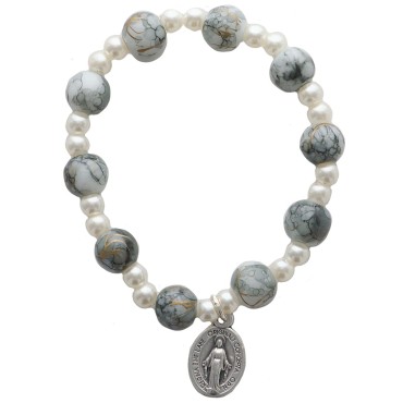 Bracelet dizainier sur élastique pour enfant grains en plastique marbre de différentes couleurs..