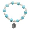 Bracelet dizainier sur élastique pour enfant grains en plastique marbre de différentes couleurs..