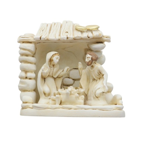 Nativité en résine dans cabane H. 4,8 cm en boite..
