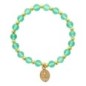 Bracelet sur élastique grains rond en verre Ø 6 mm avec médaille de la V. Miraculeuse de couleur dorée. Différentes couleurs