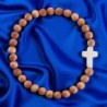 Bracelet sur élastique grains bois Ø 6 mm croix turquoise synthétique