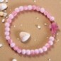 Bracelet élastique, perles en verre Ø 6 mm avec croix. Lot de 6 assortis.