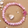 Bracelet élastique, perles en verre Ø 6 mm avec croix. Lot de 6 assortis.