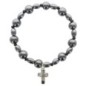 Bracelet dizainier sur élastique grains en hématite ronds et ovales avec croix en métal..